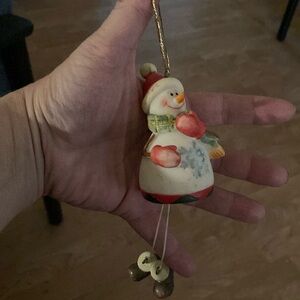 Snowman bell-style holiday ornament
